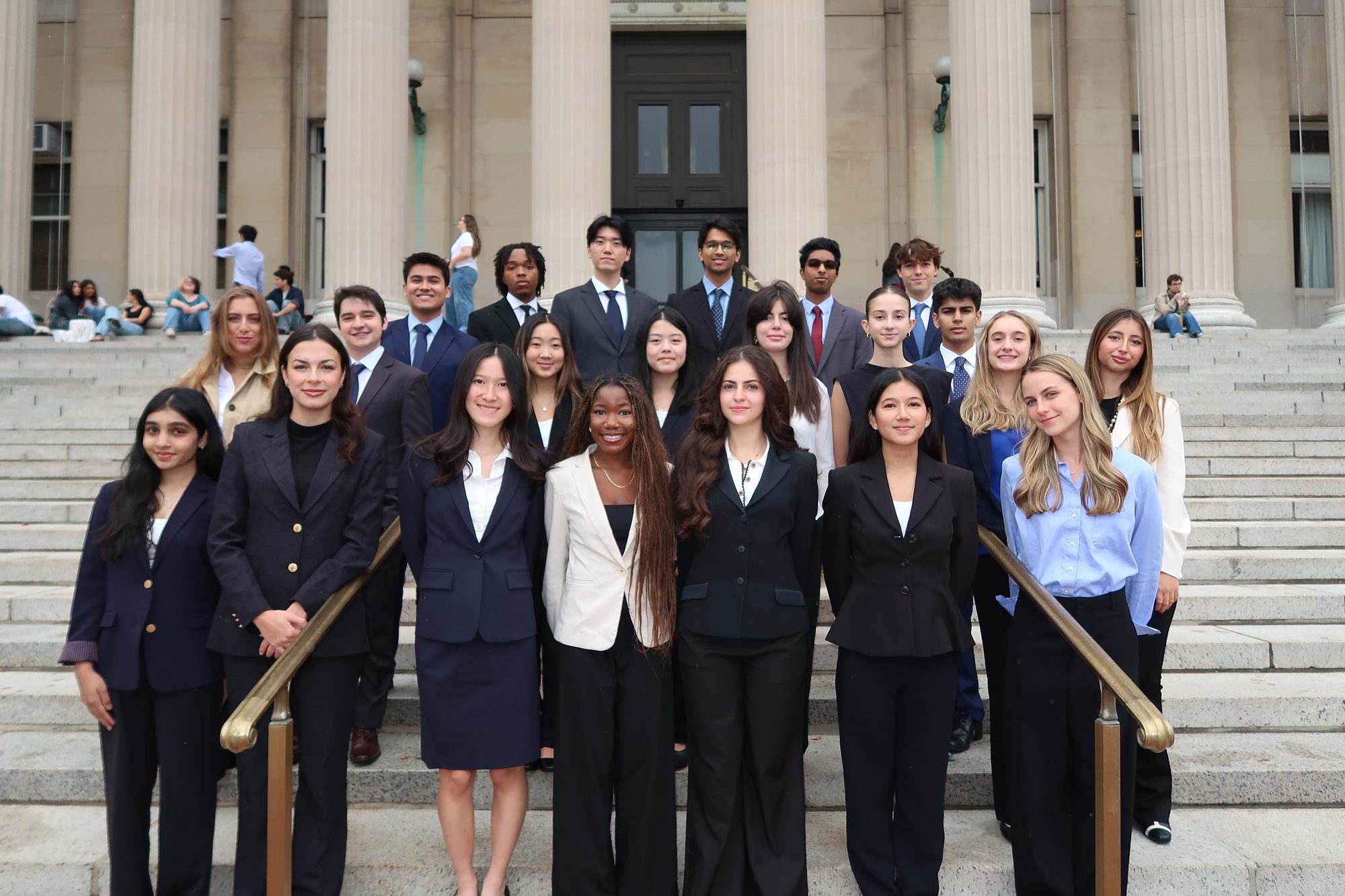 The Fall 2026 new analyst class on the steps of Low Library